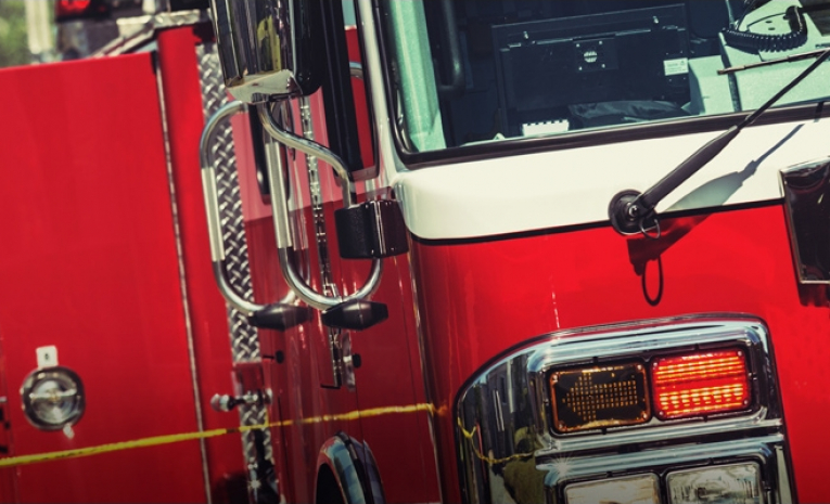Firetruck on the street with caution tape