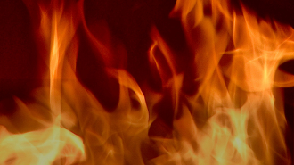 Close up of fire in a dark room