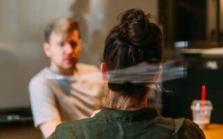 Two-people-sitting-at-a-table-scaled-aspect-ratio-320-200